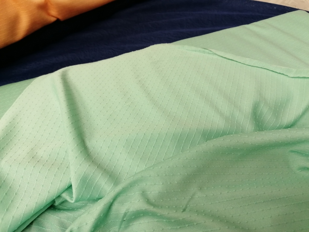 Vintage structuur jersey – Dunne rekbare groene jersey met textuur /10cm