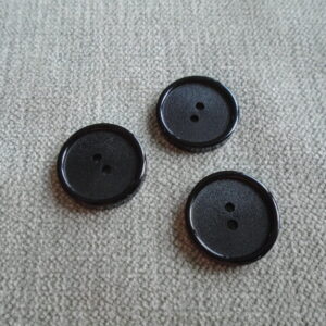 zwarte knoop met rand  18mm