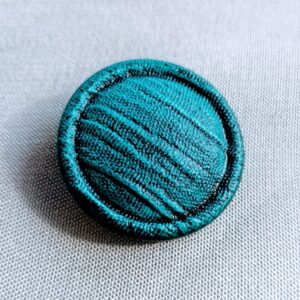 grote groenblauwe knoop 32mm