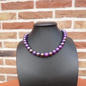 paarse kralen met glans op wax koord