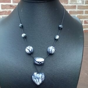 kralen aan wax koord