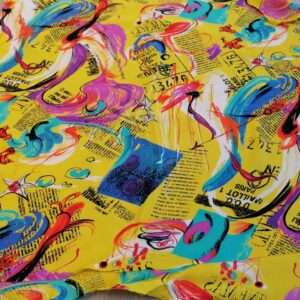 gele stof met tekening en letters 0,65m