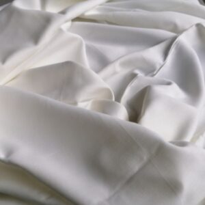 witte katoen platbinding gedrapeerd