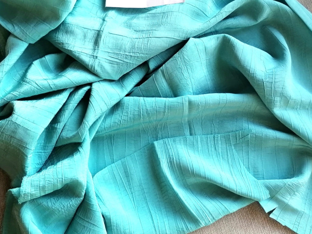blauwgroene viscose kreukelstof 1,3m