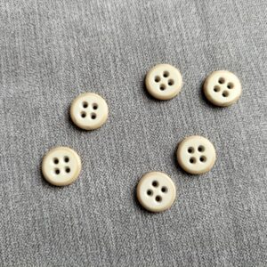 beige knoop met donkere rand 18mm
