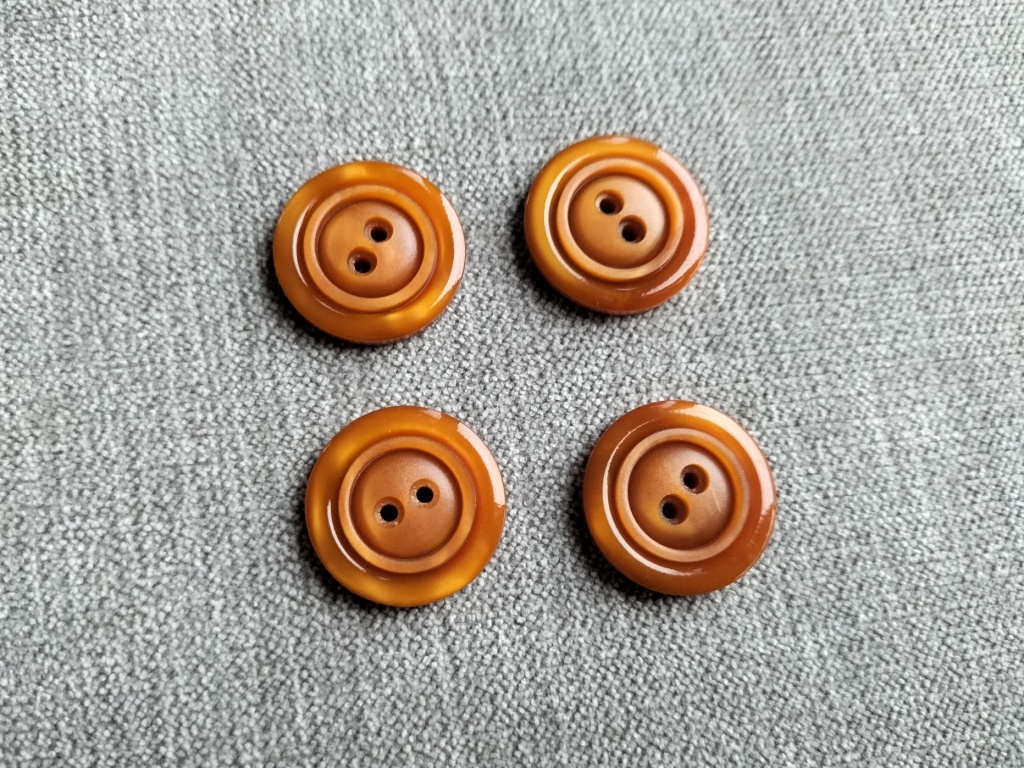 roestbruine knoop met ronde randen 23mm