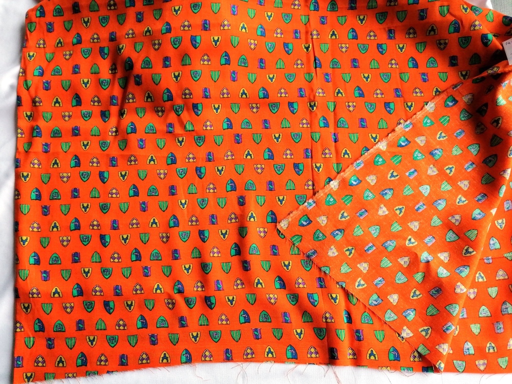 Detail van oranje katoenen stof