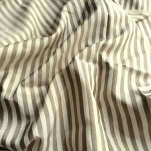 kreukelstof beige bruine strepen gedrapeerd