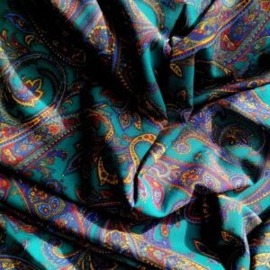 Groene wollen stof met Presley-motief gedrapeerd