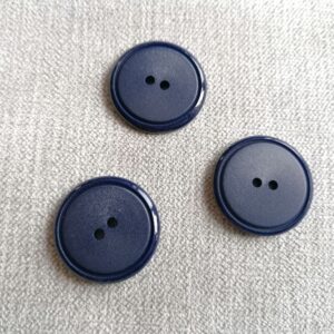 blauwe knoop met rand  25mm