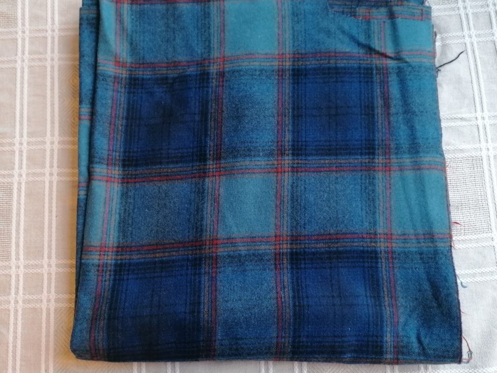 Blauwe wollen Schotse ruit