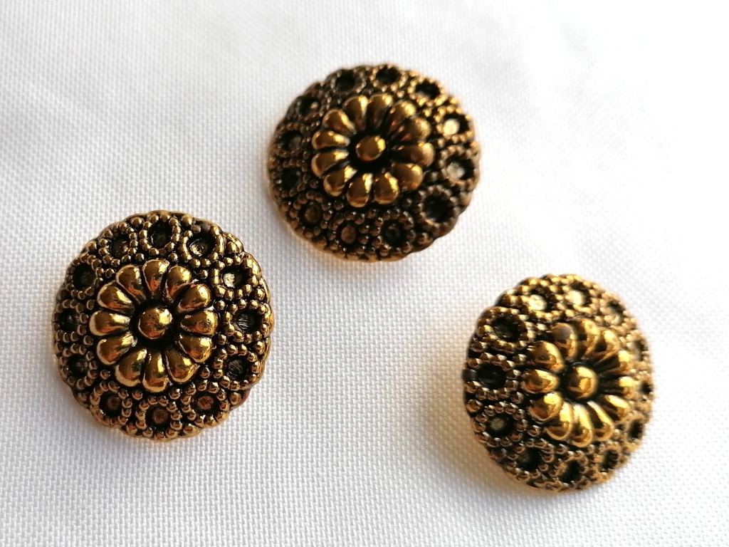 goudkleurige metalenknoop met zwart 25mm