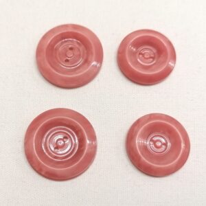 vintage bleekrode knopen 22mm en 19mm