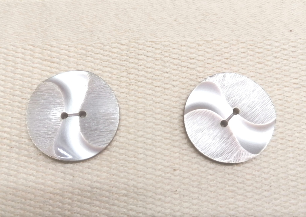 lichtbeige lila knoop met boog 28mm 2 stuks