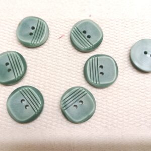 grijsgroene knopen 18mm 7 stuks