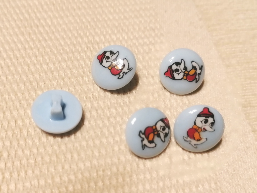 Lichtblauw kinderknoopje met eendje 13mm