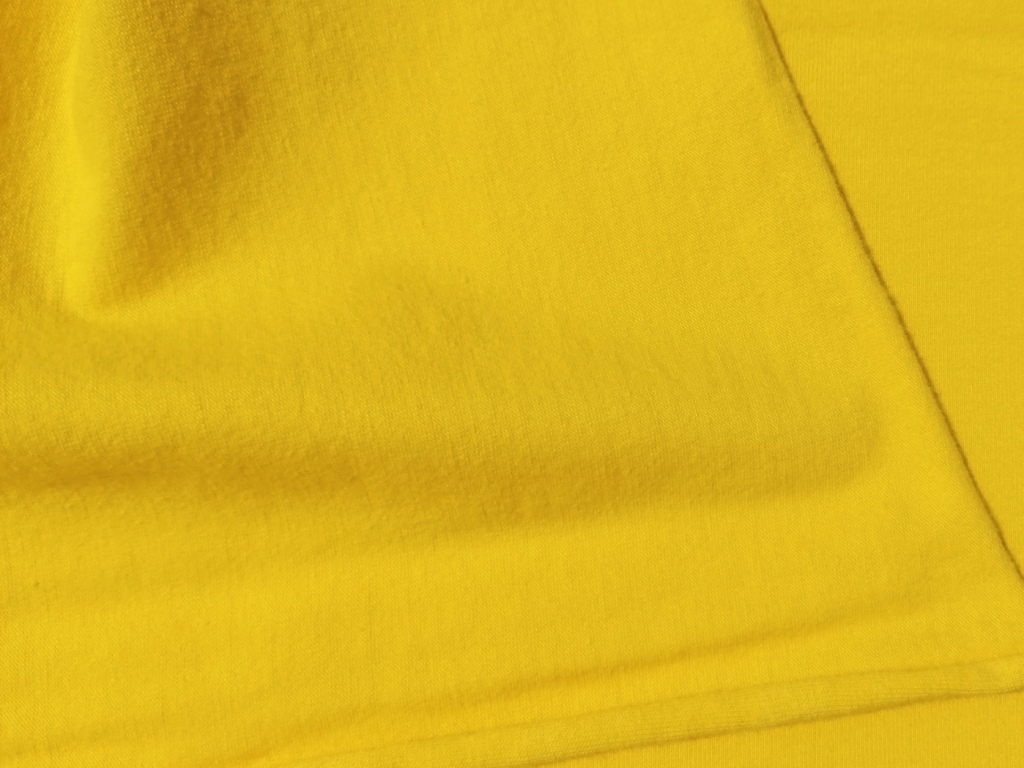 Gele katoenen jersey stretch voor- en achterzijde — 145 cm breed VivCreatiV