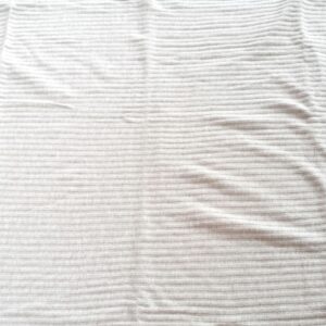 Beige gebreide ribstof