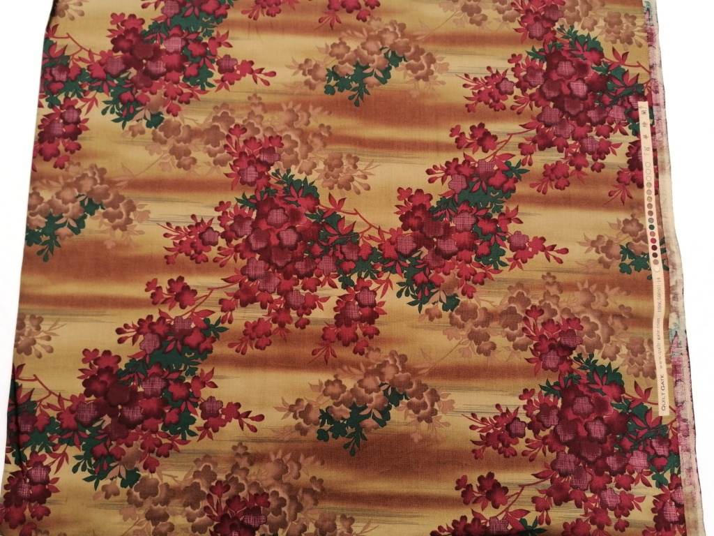quiltstof in rood beige tinten /10cm