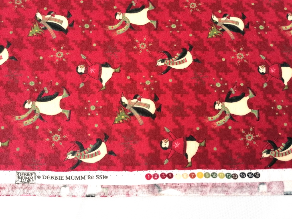 quiltstof flanel rood met pinguïns /10cm