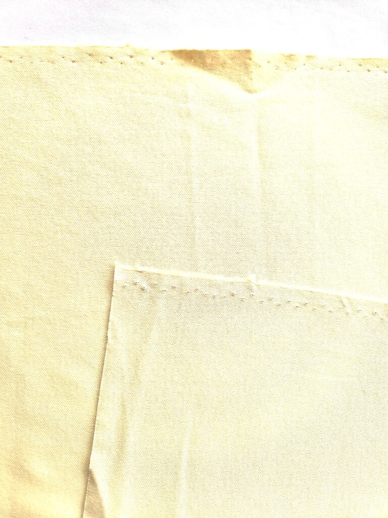 Lichtbeige katoenen jersey stof, voor- en achterzijde