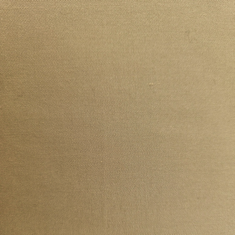 Fijne beige gabardine stof detail